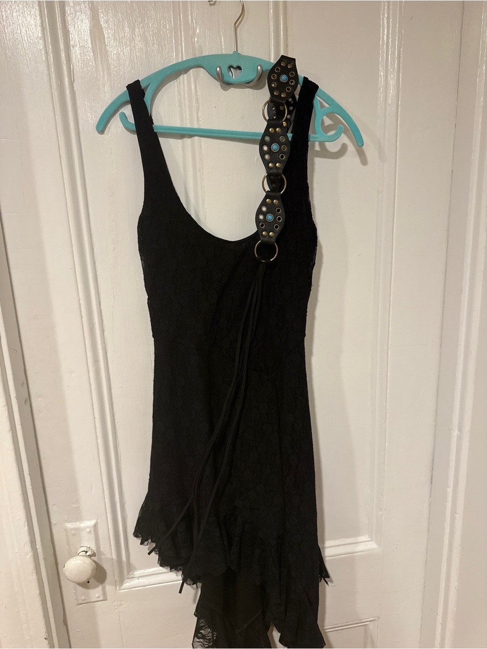 Western inspired Black Lace Asymmetrical Ruffle Dress with fringe belt